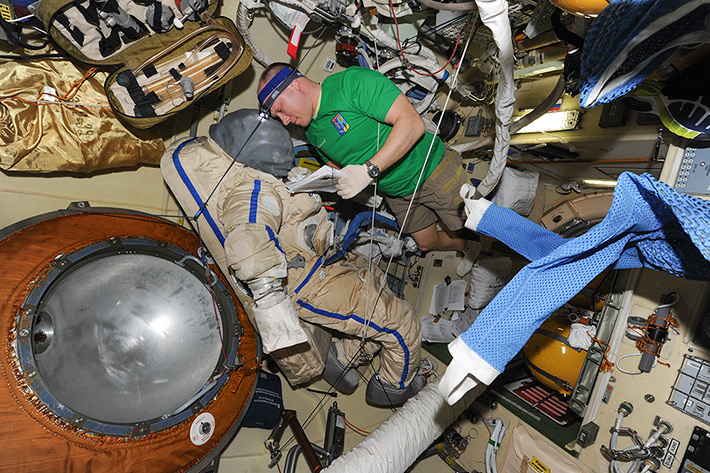 Preparing spacesuits to spacewalk
